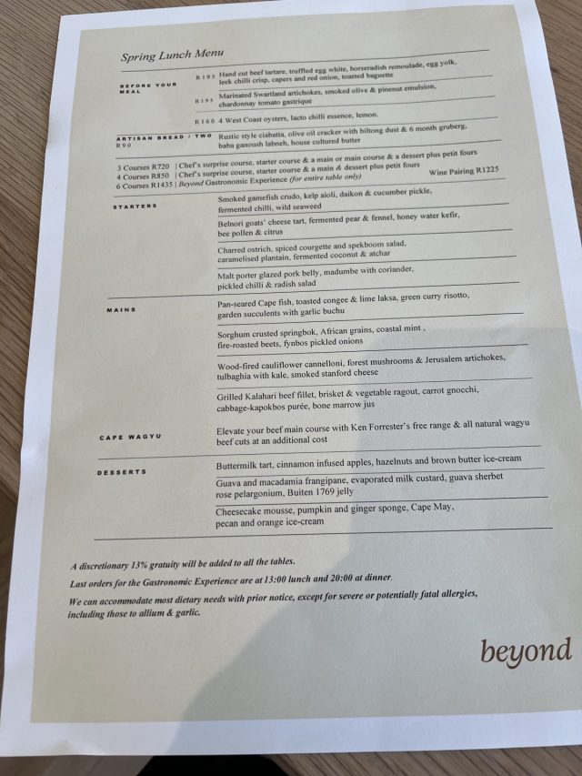 Spring Lunch Menu featuring various courses, including starters, mains, and desserts, with detailed item descriptions and prices.